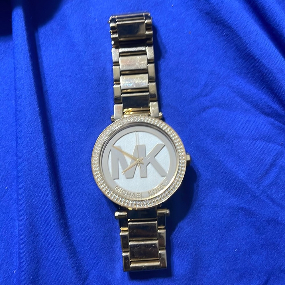 Gold MK watch with diamonds